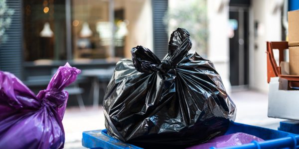 black-bags-trash-garbage-bin-during-daytime