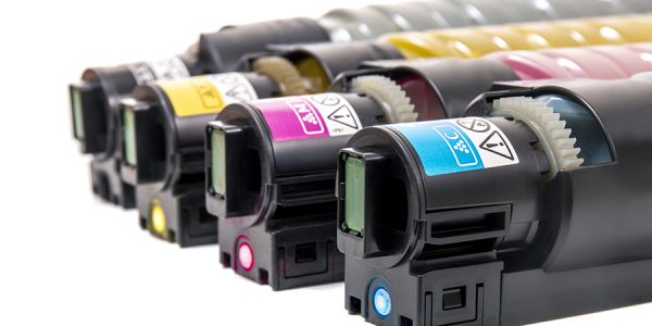cartridges for laser printers aligned on a white background.